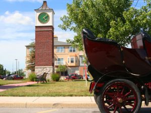 Sylvania, OH clock tower and old-fashioned buggy